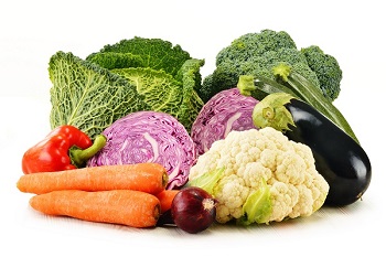Variety of fresh organic vegetables isolated on white
